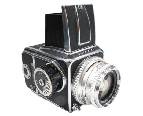 A Hasselblad 500C SLR camera, with a Carl Zeiss Jena 80mm lens, etc.