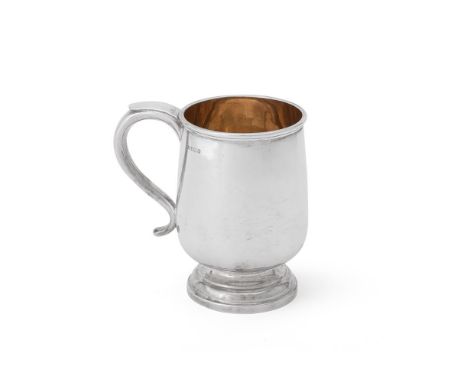
	
		A SILVER OVOID FOOTED PINT MUG 
		WALKER &amp; HALL, SHEFFIELD 1938 
		With a rolled rim, a tongue-capped S-scroll handl
