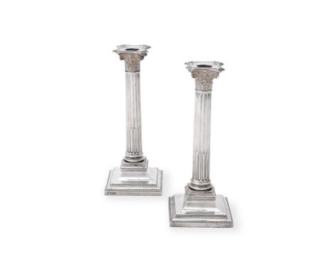 
	
		A PAIR OF LATE VICTORIAN SILVER CORINTHIAN COLUMN CANDLESTICKS 
		HAWKSWORTH, EYRE &amp; CO. LTD, SHEFFIELD 1900 
		With