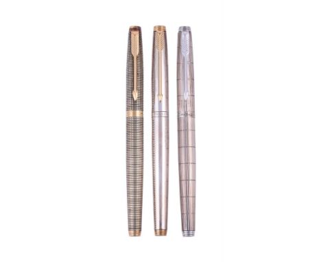 
	
		PARKER, 75, THREE SILVER COLOURED FOUNTAIN PENS
		CISELE
		Cap and Barrel: The sterling cap and barrel, stamped Parker U