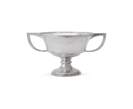 
	
		A SILVER TWIN HANDLED PEDESTAL CUP 
		WILMOT MANUFACTURING CO., BIRMINGHAM 1922 
		13cm (5 1/4in) high 
		379g (12.15 oz