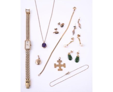 
	
		A SMALL COLLECTION OF GOLD COLOURED JEWELLERY 
		To include a 9 carat gold cross pendant, hallmarked Chester 1908, 3cm l