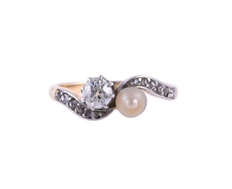 
	
		AN EARLY 20TH CENTURY DIAMOND AND PEARL TOI ET MOI RING
		The crossover ring with a pearl and an old cut diamond, estima