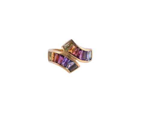 
	
		H. STERN, A MULTI GEM CROSSOVER RING
		The crossover panel channel set with tapered baguette cut semi precious gem stone