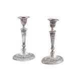 A PAIR OF EDWARDIAN SILVER OVAL CANDLESTICKS, THE GOLDSMITHS & SILVERSMITHS CO. LTD