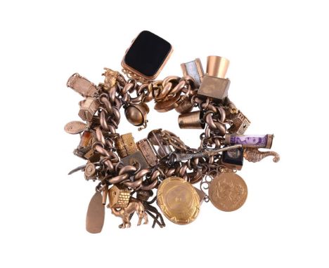 
	
		A MID 20TH CENTURY 9 CARAT GOLD CHARM BRACELET
		The curb link bracelet suspending various charms including a Victorian 