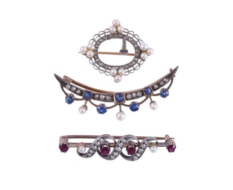 
	
		THREE ANTIQUE BROOCHES
		The first a late Victorian crescent brooch, circa 1890, with cushion cut sapphires, old cut dia