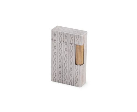 
	
		S. T. DUPONT, A WHITE ALLOY LIGNE 2 GAS LIGHTER 
		FRENCH, LATE 20TH CENTURY 
		Engraved with a helix design, in A S. T.
