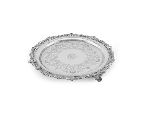 
	
		A CASED LATE VICTORIAN SILVER SHAPED CIRCULAR SALVER 
		JOSEPH RODGERS &amp; SONS, SHEFFIELD 1897
		With a chased floral
