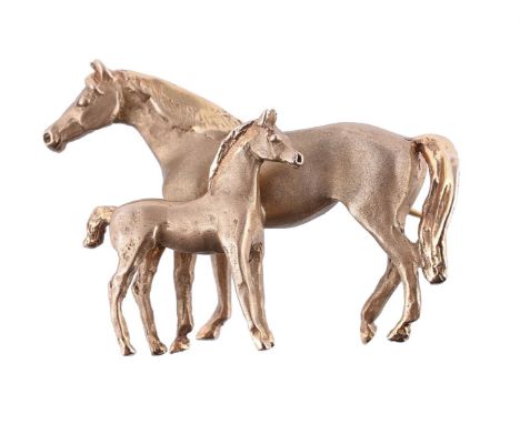 
	
		A 9 CARAT GOLD MARE AND FOAL BROOCH 
		LONDON 1986
		The mare and foal with matt bodies and polished textured mane and t