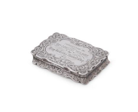 
	
		AN EARLY VICTORIAN SILVER SHAPED RECTANGULAR SNUFF BOX 
		NATHANIEL MILLS, BIRMINGHAM 1845 
		Engraved with scroll folia