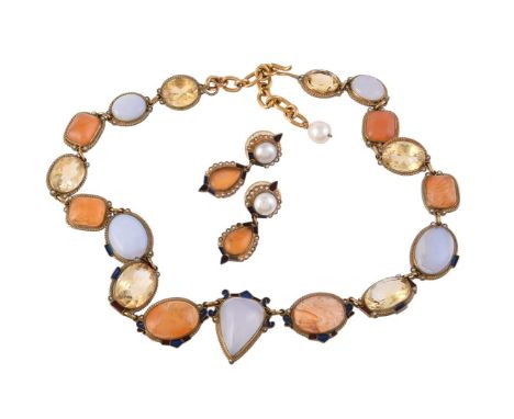 
	
		PERCOSSI PAPI, SILVER GILT, AGATE AND CITRINE NECKLACE
		The alternating cabochon lace agate, cornelian, and oval cut ci