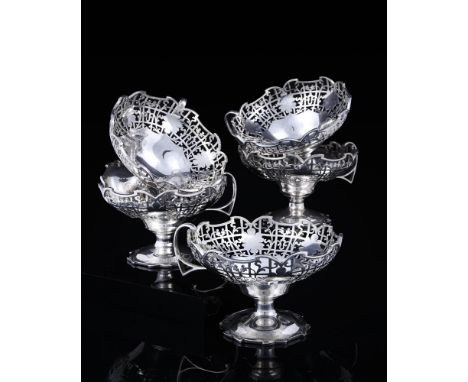 
	
		A SET OF FIVE SILVER PEDESTAL SUNDAE DISHES 
		VINERS LTD, SHEFFIELD 1933 
		Shaped circular with angular handles, shape