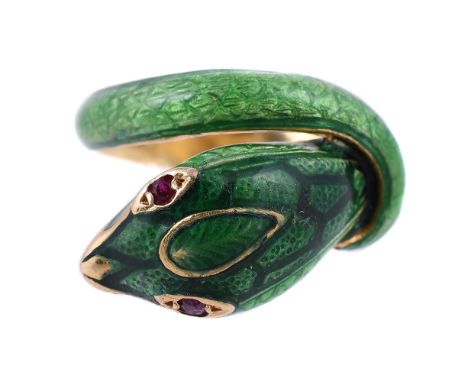 
	
		A FRENCH ENAMELLED SNAKE RING
		The coiled green snake with circular cut ruby eyes, the back of the shank stamped with F