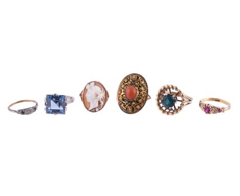 
	
		Y&nbsp;A COLLECTION OF SIX RINGS
		The first with a step cut blue synthetic spinel, the shank stamped 18ct; a synthetic 