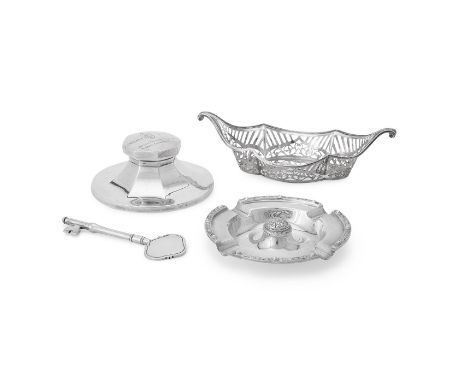 
	
		A GROUP OF FOUR SILVER ITEMS 
		Comprising: a circular Celtic Knot pattern ashtray by Garrard &amp; Co. Ltd, Birmingham 