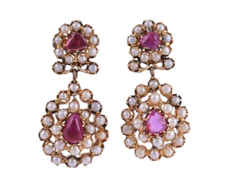 
	
		A PAIR OF RUBY, PEARL AND CULTURED PEARL EAR PENDANTS
		The flower head pediments with a central cabochon ruby within a 