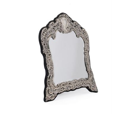 
	
		AN EDWARDIAN SILVER MOUNTED DRESSING TABLE MIRROR 
		THE GOLDSMITHS &amp; SILVERSMITHS CO. LTD, LONDON 1905 
		With a va