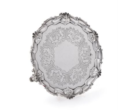 
	
		A VICTORIAN SILVER SALVER  
		EDWARD BARNARD AND JOHN BARNARD, London 1860
		With engraved decoration to the centre and 