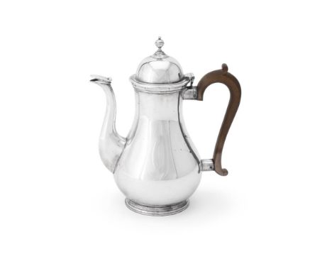 
	
		A SILVER BALUSTER COFFEE POT 
		MAPPIN &amp; WEBB, LONDON 1918 
		With a ball finial to the domed cover and a compositio