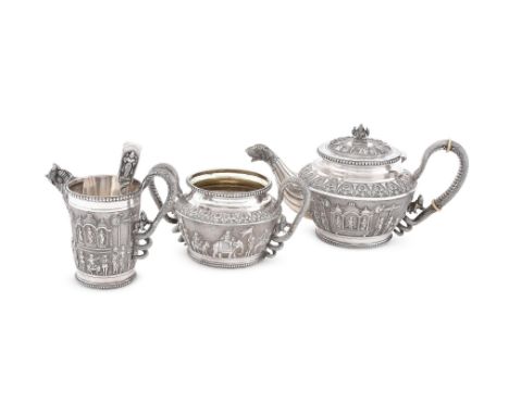 
	
		Y&nbsp;AN INDIAN SILVER CIRCULAR THREE PIECE TEA SERVICE 
		P. ORR &amp; SONS, MADRAS, CIRCA 1860 TO 1900 
		The tea pot