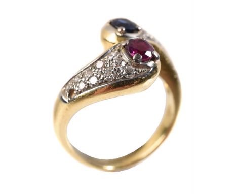 
	
		A RUBY, SAPPHIRE AND DIAMOND CROSSOVER RING
		The terminals each set with an oval cut sapphire and ruby with eight cut d