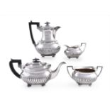 A LATE VICTORIAN SILVER OBLONG BALUSTER FOUR PIECE TEA SERVICE, COOPER BROTHERS