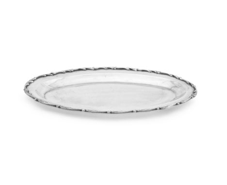 
	
		A COLUMBIAN SILVER COLOURED OVAL SALVER
		STAMPED GH over S AND 0900, 20TH CENTURY 
		With an applied scroll border 
		2