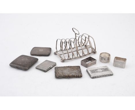 
	
		Y&nbsp;A COLLECTION OF SILVER ITEMS
		Comprising: a George III six division toast rack, maker's mark obscured, Sheffield