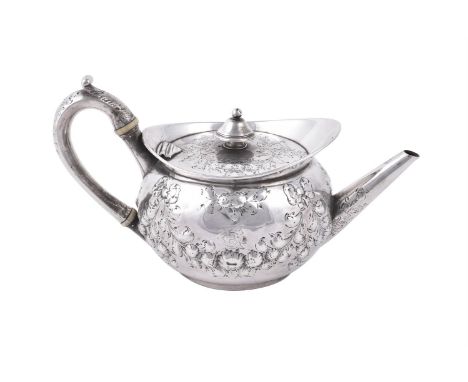 
	
		A GEORGE III SILVER CIRCULAR TEA POT 
		PAUL STORR, LONDON 1799 
		With a bell shaped finial to the foliate chased cover