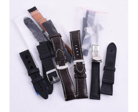 
	
		Y&nbsp;A COLLECTION OF BRANDED WATCH STRAPS
		To include: three black rubber straps, stamped Breitling, two with pin buc