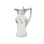 AN ART NOUVEAU SILVER MOUNTED GLASS CLARET JUG, THOMAS BRADBURY & SONS LTD