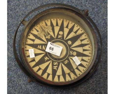 Gimballed brass ship's compass.