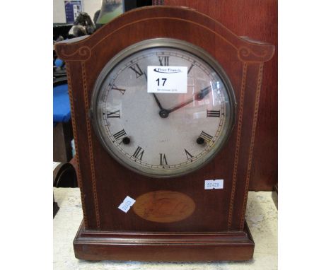 Edwardian inlaid mahogany two train arched mantel clock with silvered Roman face.