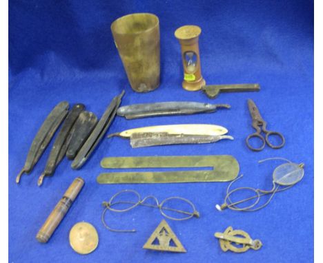 Box of interesting oddments of militaria including some buttons and badges, cut-throat razors, spectacles, boxwood egg timer,