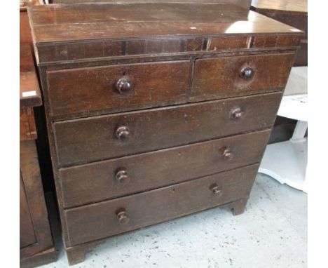 Early 19th Century oak straight front chest of two short and three long drawers on bracket feet.