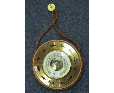 20th Century wall barometer with astrological signs.