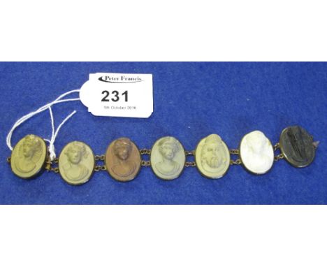 Victorian lava Grand Tour portrait cameo bracelet. CONDITION REPORT: Staining to white cameo. Some noticeable nicks to cameo'