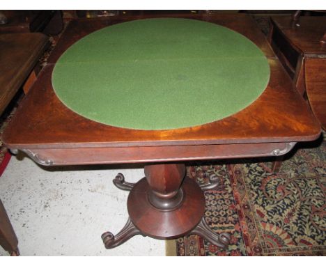 19th Century walnut folding card table on baluster circular pedestal and scroll feet.