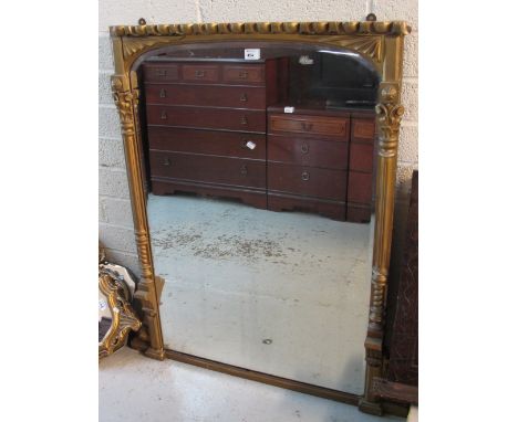 Large rectangular bevel plate over-mantel mirror with gilt carved foliate and fan decoration. CONDITION REPORT: Measurements 