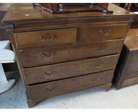 Early 19th Century oak straight front chest of two short and three long drawers on  bracket feet. CONDITION REPORT: width is 