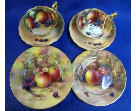 Group of Royal Worcester fruit painted bone china items to include: two cups and saucers signed by W.H. Austin; a dessert pla