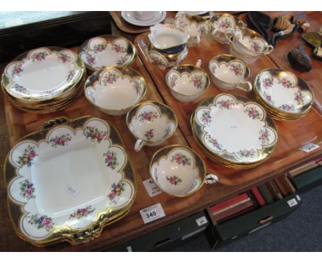 Two trays of Aynsley bone china floral and fruit design teaware to include: teacups and saucers; milk jug; sucrier; side plat