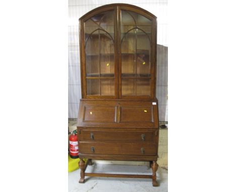Early 20th Century oak, arch topped, glazed, bureau bookcase.