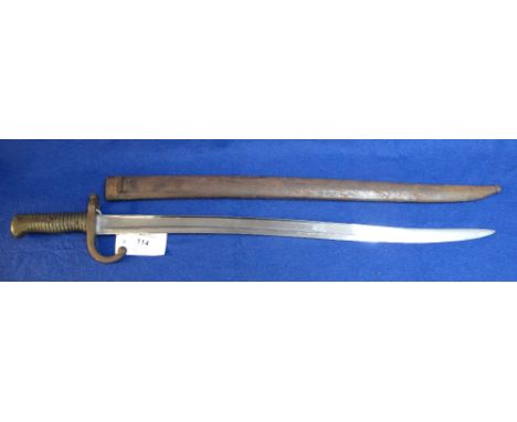 19th Century French sword bayonet with brass hilt and metal scabbard.