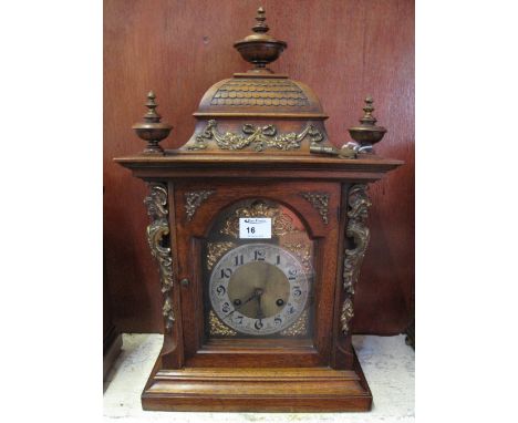 Early 20th Century German architectural two train mantel clock with brass face and silvered Arabic chapter ring, yellow metal