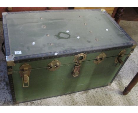 Vintage canvas trunk with metal banding and stud work.