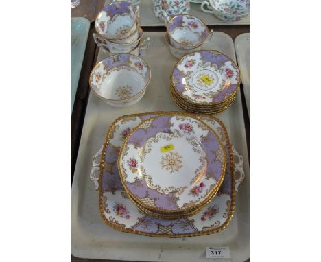 Tray of late 19th/early 20th Century Coalport china teaware items on a white ground with gilt foliate and floral spray decora