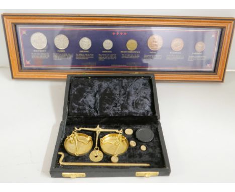 A set of apothecary scales and a framed set of pre-decimal coins, Sterling Collections 