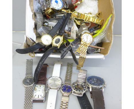 A quantity of lady's and gentleman's wristwatches; Timex, Swatch, Sekonda, etc. 